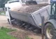 Camion cu roțile blocate în mocirla din Dângeni FOTO